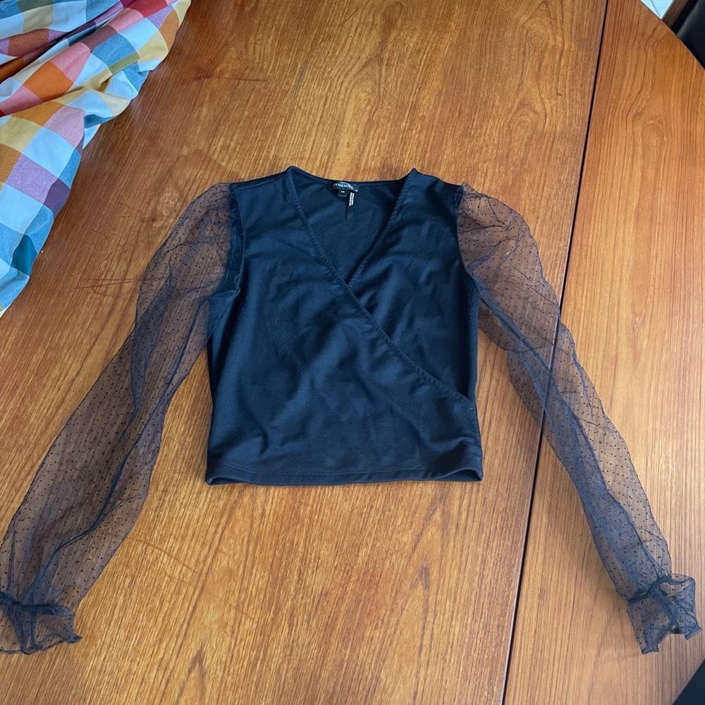 Dynamite black v-neck top with sheer polka dot slight puff sleeves
